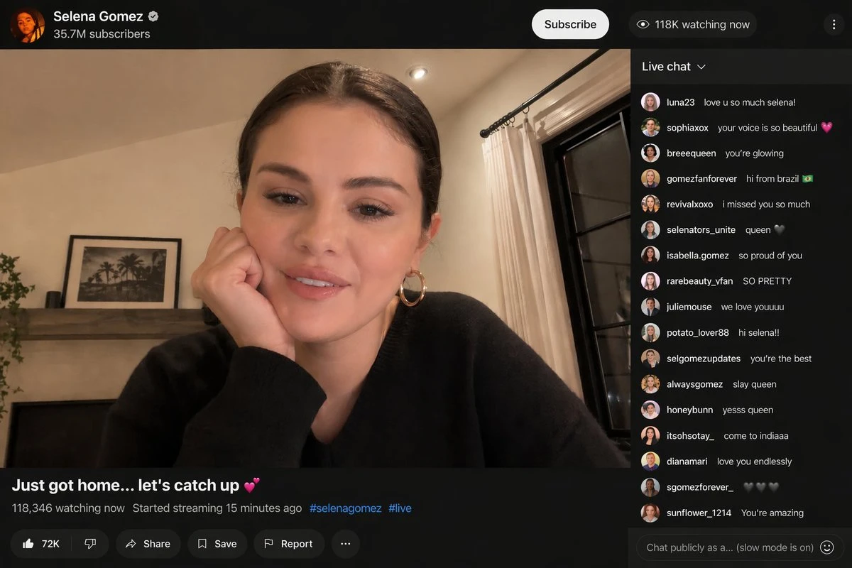 Selena Gomez engages with fans during a surprise livestream on YouTube, featuring a cozy home setting and an active chat