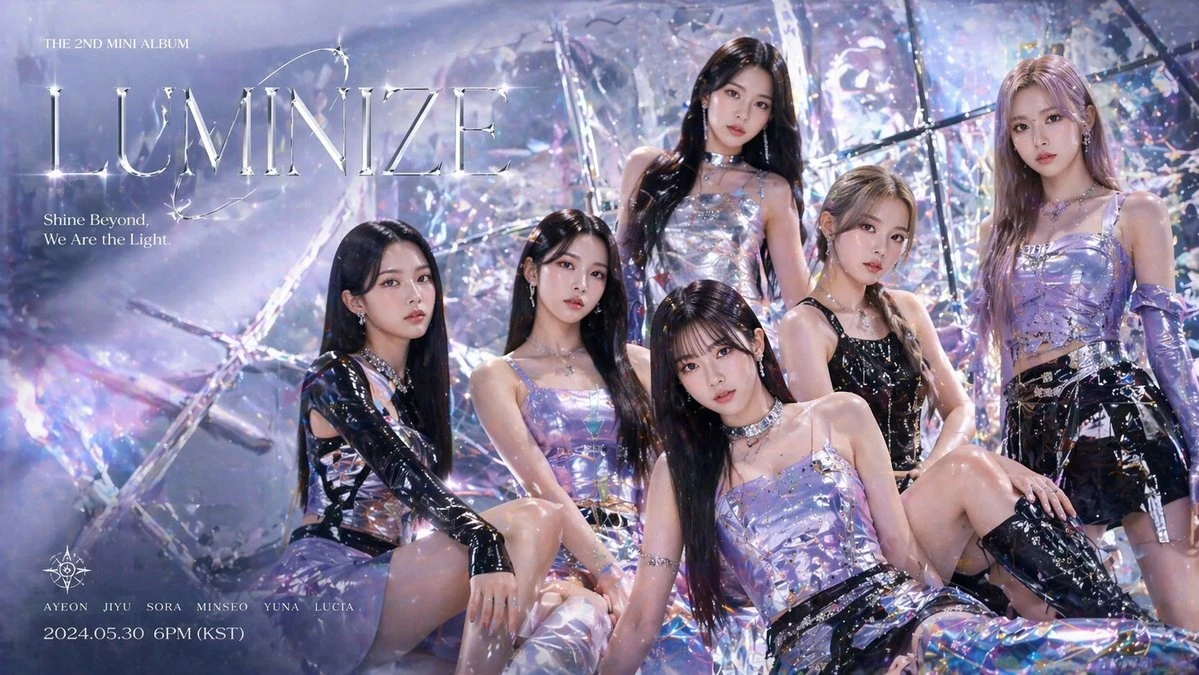 Six members pose in shimmering outfits against a reflective backdrop, promoting the album "LUMINIZE" set for release on May 30, 2024