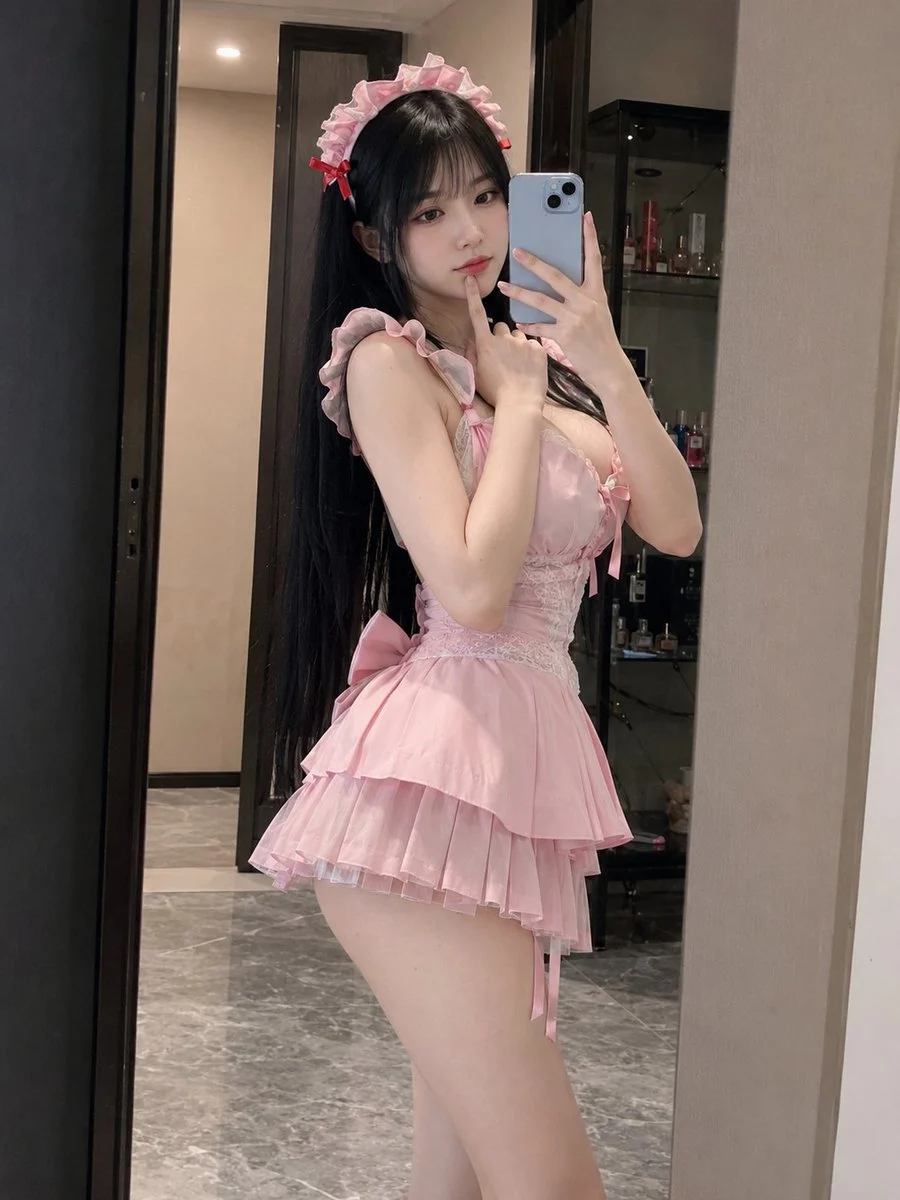 Pink Maid Outfit Mirror Selfie with expressive portrait styling, crisp facial detail and profile-ready composition