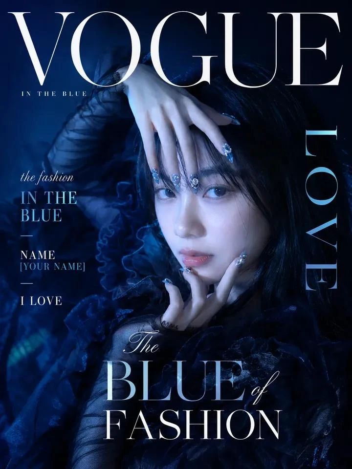 A young woman with intricate nail art poses dramatically on the cover of VOGUE against a dark blue background.