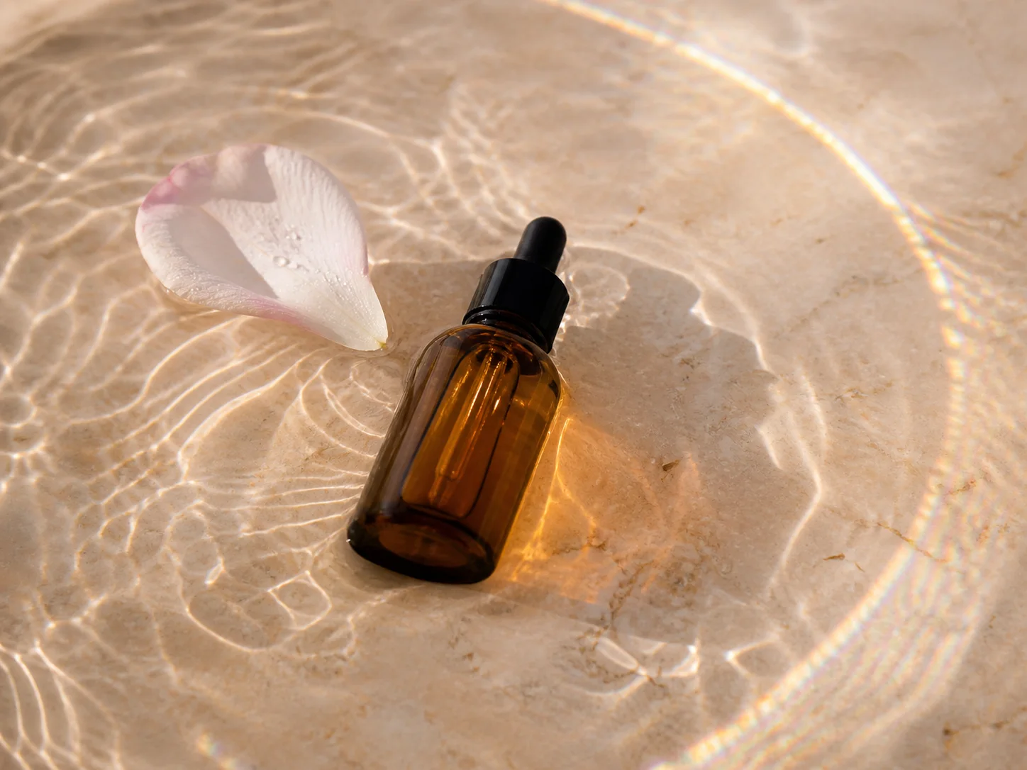 Amber botanical serum bottle standing in shallow water generated by Image 2